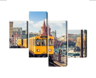 Obraz Wieloczęściowy Żółty Pociąg W Berlinie Na Torach Kolejowych