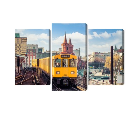 Obraz Wieloczęściowy Żółty Pociąg W Berlinie Na Torach Kolejowych Obraz Wieloczęściowy Żółty Pociąg W Berlinie Na Torach Kolejowych