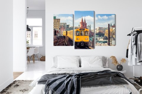 Obraz Wieloczęściowy Żółty Pociąg W Berlinie Na Torach Kolejowych Obraz Wieloczęściowy Żółty Pociąg W Berlinie Na Torach Kolejowych