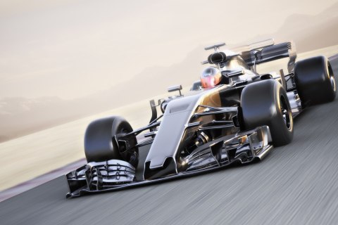 Obraz Wieloczęściowy Samochód Formuły 1 Na Torze Wyścigowym Obraz Wieloczęściowy Samochód Formuły 1 Na Torze Wyścigowym