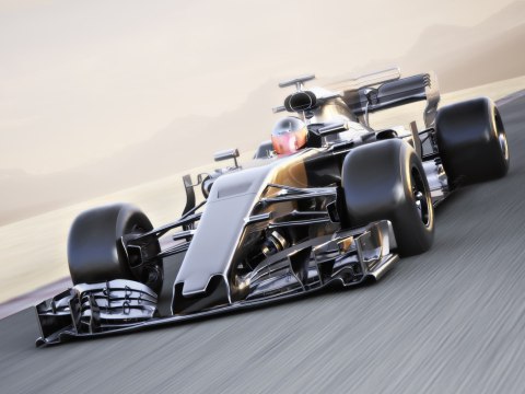 Obraz Wieloczęściowy Samochód Formuły 1 Na Torze Wyścigowym Obraz Wieloczęściowy Samochód Formuły 1 Na Torze Wyścigowym