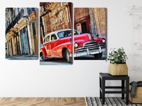 Obraz Wieloczęściowy Stary Amerykański Samochód I Budynki Hawany