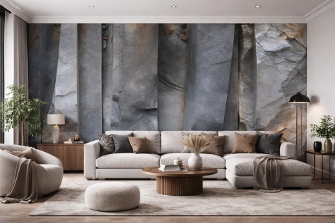 Nowoczesny salon z fototapetą imitującą pionowe warstwy skały w ciemnych odcieniach szarości.