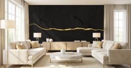 Elegancki, jasny salon z ciemnym muralem ze złtą żyłą.