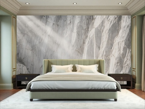 Fototapeta z motywem górskich skał i słońca za łóżkiem, tworząca przytulny klimat w sypialni.