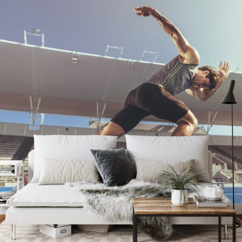 Fototapeta Sprinter Wybiegający Z Bloku Startowego